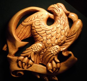 The eagle carving was sealed, stained and then coated with polyurethane varnish.